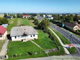 Mimoriadne veľký 55-árový pozemok so starším domom pri Vra